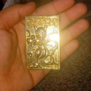 A gold 23k mewtwo 1999 Nintendo